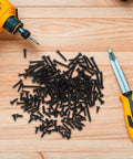 Self Tapping Screws Assortment Kit, 450pc Set With Cross Round Head, Carbon Steel scattered on wooden surface with drill