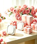 Two Pack Plug In Dimmable Night Light With Auto Dusk To Dawn Sensor Blue LED Night Light on table with pink roses and gifts