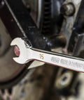 19Mm 4 Degree Swing Arch 12 Point Ratcheting Combination Wrench With Off Corner Loading in use on mechanical part