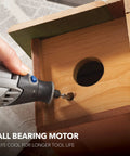 All Purpose Corded Variable Speed Rotary Tool Kit With 6 Speeds drilling into wooden birdhouse, showing ball bearing motor use