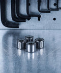 Four Piece One Way Clutch Bearing 8Mm ID 14Mm OD Silver Silent Ratcheting Flywheel Bearing for Weight Machines on metallic surface.