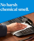Hand cleaning keyboard with EcoClean Disinfecting Wipes Multipurpose Plant Based Formula That Kills 99.9 Percent Of Germs In Minutes