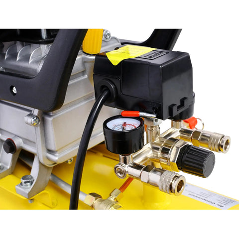 Close-up of pressure gauge and control valves on This Bad Boy 13 Gallon Air Compressor for precise airflow management.