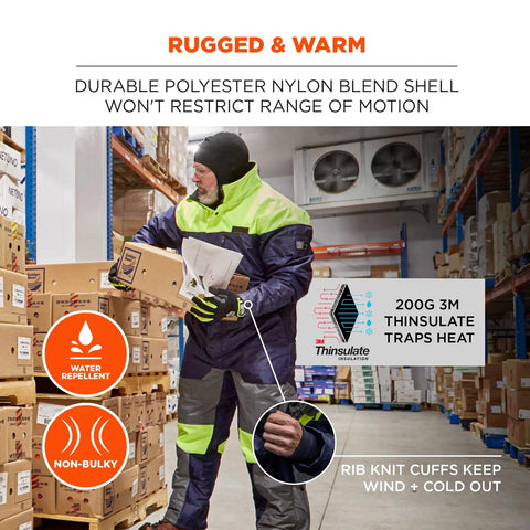 Heavy Duty Insulated Freezer Work Coveralls Built To Blast Through The Deep Freeze With Rock Solid Thermal Armor And Water Repellent Winter Job Gear For Cold Storage Crews, worn by worker in warehouse.