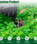 Hand installing 12 Inch Galvanized Landscape Staples Stakes For Weed Barrier Fabric And Garden Projects into ground