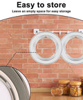 Two Tier Bamboo Food Steamer Basket For Dumplings And Fresh Seafood With No Sweat Cleanup hanging on wall for storage.
