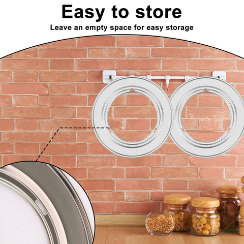 Two Tier Bamboo Food Steamer Basket For Dumplings And Fresh Seafood With No Sweat Cleanup hanging on wall for storage.