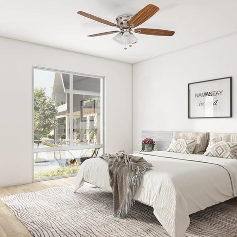 Glen Alden 52 Inch Classic Dope Flush Mount Indoor LED Ceiling Fan with Light Kit in a modern bedroom, brushed nickel finish.