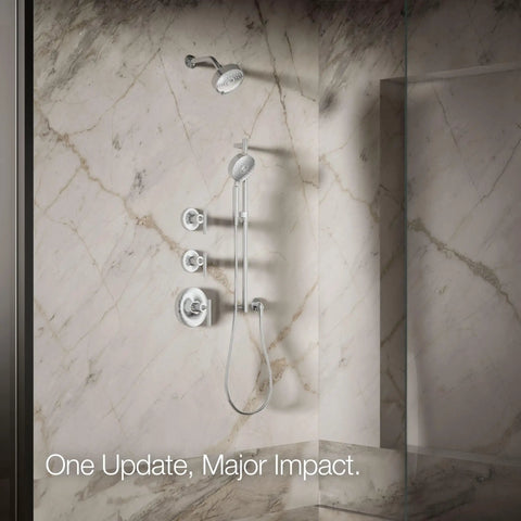 Purist Three Function Showerhead 2.5 Gpm Polished Chrome installed in marble bathroom with full coverage spray head.