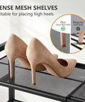 Close-up of high heels on the Rock Solid Expandable Shoe Rack Black Two Tier Metal Closet Organizer.