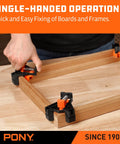Person using Four Pack Right Angle Woodworking Clamps With Adjustable Jaw For 90 Degree Corners to hold frame on table