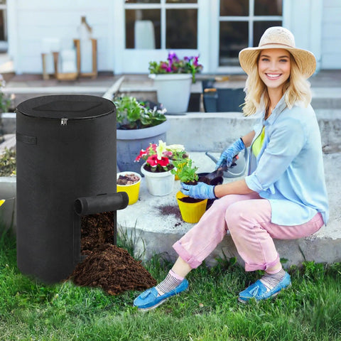 34 Gallon Outdoor Compost Bin With Handles And Observation Windows, Thickened Breathable Foldable Design For Easy Garden Yard Recycling, Home Compost Bucket, No Mess And Durable Black 1 Pack with a gardener preparing plants in the background.