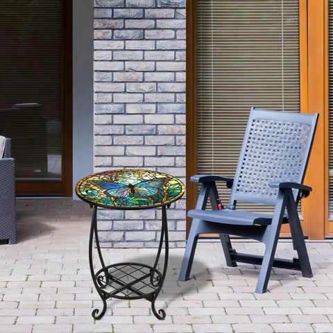 Outdoor Round Side Table 14 Inch Mosaic Butterfly Style Patio Accent Table beside blue chair on a porch