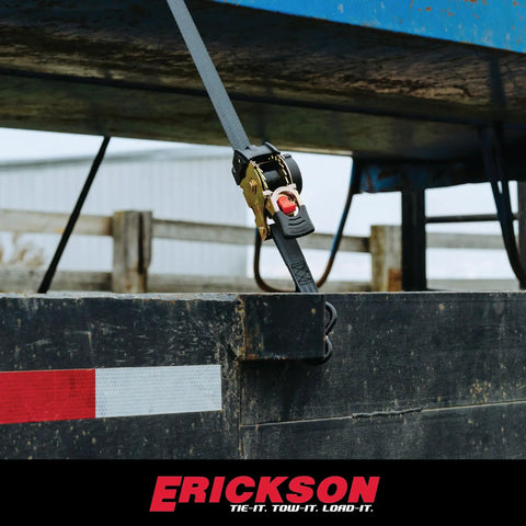 No Nonsense Retractable Ratcheting Tie Down Straps 2 Pack Black 1 In X 6 Ft With Vinyl Coated Hooks on a trailer.