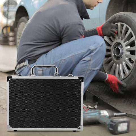 Lockable Aluminum Alloy Toolbox With Ergonomic Handle Rock Solid Portable Storage Case For Mechanics And Builders Multi Purpose Workgear on job site with tire change.