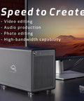 Thunderbolt 4 16TB Raid Enclosure With Four Storage Bays, black desktop design, ideal for video and audio editing setup.