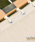 Close-up of Two Person Double Quilted Fabric Hammock With Spreader Bar And Detachable Pillow For Outdoor Patio Backyard Poolside