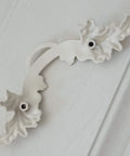 2.5 Inch Center To Center Shabby Chic Pull Handle Cream White With Gold Accent For Dresser Drawer Kitchen Cabinet Zinc Alloy Furniture Hardware 64 mm Hole Spacing Home Renovation Upgrade on a light surface.