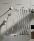 12 Inch High Pressure Rainfall Shower Head Handheld Combo with 15 Inch Brass Extension Arm and 60 Inch Stainless Steel Hose in bathroom