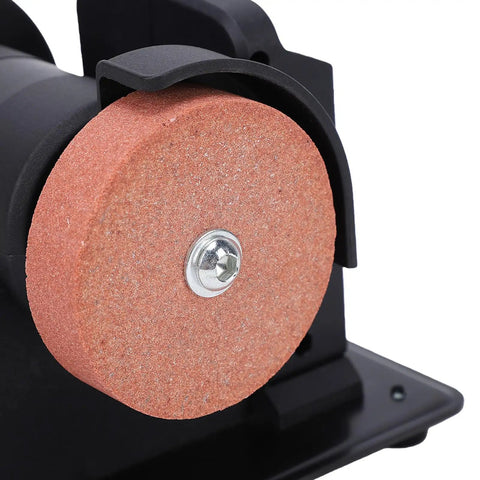 Close-up of coarse grind wheel on a cordless mini bench grinder for fast rust removal.
