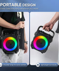 Totally Party-Ready Portable Bluetooth Karaoke System held by person, LED lights on display, easy to carry.
