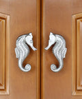 Coastal Seahorse Cabinet Knobs Set In Brushed Nickel Finish Small Matched Pair On Wooden Cabinets