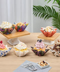 Colorful cupcakes in Bulk 4000 Pack Greaseproof Cupcake Liners 10.2 Ounce Disposable Oven and Freezer Safe Paper Muffin Cups.