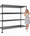 Built Different 4 Tier Metal Shelving Unit With Smooth Rolling Wheels Heavy Duty Carbon Steel Mesh Construction Featuring Reinforced Support Ribs For Zero Sagging And Maximum Weight Capacity In A Sleek Black Finish Perfect For Storage next to a woman in a polka dot dress.