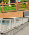 Beefy Heavy Duty 4x4 Post Base Set Of 5 for 3.5x3.5 lumber securing deck and porch railings, wood and white posts visible, outdoors.