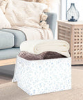 Built Tight Foldable Storage Bin With Heavy Duty Handles And Velcro Close Top For No Sweat Organization. Collapsible box holding three blankets.