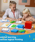 Base Ten Blocks With Place Value Chart Math Manipulatives For Kids Counting Blocks in use by teacher and student at desk.