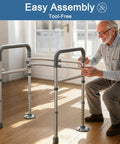 A senior man assembles the Rock Solid Adjustable Toilet Safety Rail And Grab Bar For Seniors, Supports Up To 350 Pounds.