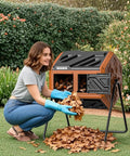 Woman using 43 Gallon Dual Chamber Compost Bin With Built In Nuts And Thermometer For Outdoor Rotating Composter Tumbler in backyard