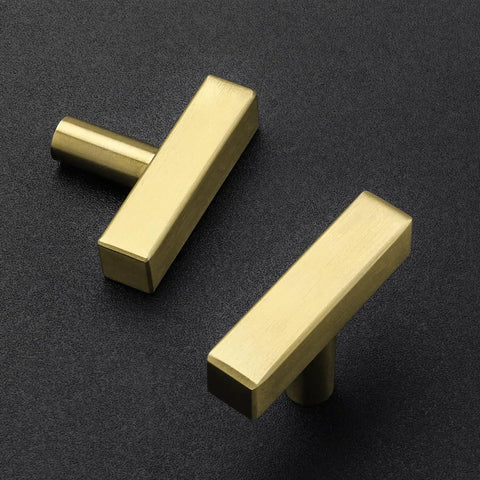 Premium Quality Top Shelf Square Cabinet Knobs And Drawer Pulls Gold Finish 2 Inch Hardware 10 Pack For Kitchen Cupboards close-up of two sleek gold square cabinet knobs