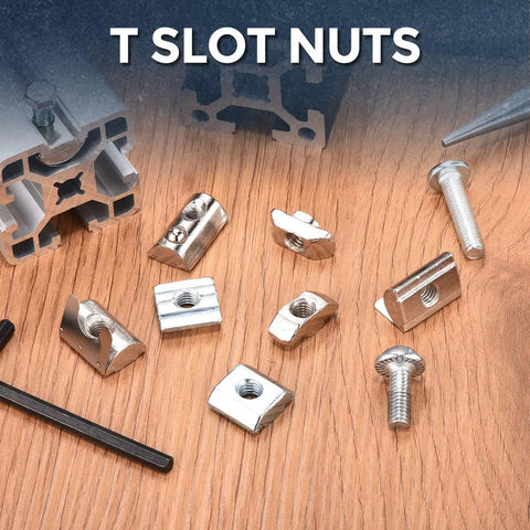 Bulletproof Heavy Duty Hammer Nuts Sliding T Fasteners For 3030 Aluminum Extrusion on wooden surface, diverse shapes and sizes.