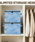 Heavy Duty Waterproof Polyester Storage Containers With A Slick Two Way Zipper Closure And Blue White Snowflake Design stacked in a closet.