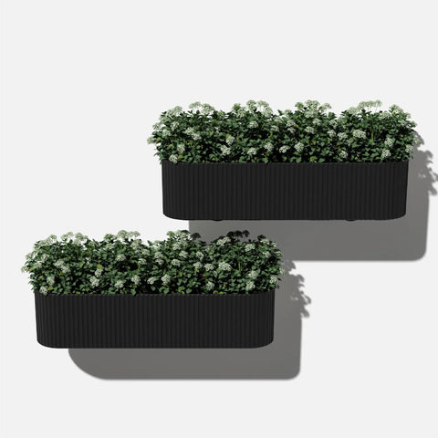 Badass Weatherproof Railing Planter Box With Secure Mounting Bracket Hella Durable Plastic Stone Composite round balcony container filled with flowers.