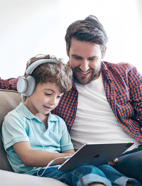 Father and son enjoying music using Premium Usb C To 3.5Mm Audio Adapter With Smart Dac Chip on tablet.