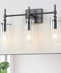 Three Light Black Vanity Light Fixture Over Mirror With Clear Glass Shades For Sleek Modern Bathroom E26 Bulb Compatible
