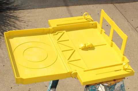 Universal Ladder Tray Rack Fits Extension And Step Ladders Heavy Duty Mid Section Tool Shelf Holds Twenty Pounds Quick Clamp Setup view from above, bright yellow durable plastic surface.