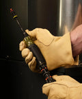 Tough As Nails 16In1 Hybrid Screwdriver Featuring Heavy Duty Rare Earth Magnet And Impact Rated Nut Driver Head, held in gloved hand.