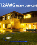 Heavy Duty 12 Gauge Outdoor Extension Cord 100 Ft Long Waterproof Power Cable for lawn use during evening.