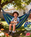 Child sitting in a blue and green canvas hammock with a cat, Canvas Hammock With Durable Comfort For Patio Yard Garden Backyard And Travel