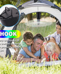 Family camping with Four Pack Portable Fly Fans For Tables Indoors Outdoors Battery Powered Tabletop Fans For Picnics Dinners Outdoor Parties Home Use Black Keeps Tables Fly Free And Food Fresh Requires Two AA Batteries Not Included, showing hook feature.