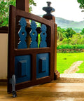 Two Inch Spring Loaded Polyurethane Gate Casters With Adjustable Bracket For Heavy Duty Fence Doors Garden Gates And Utility Carts shown on a wooden gate.