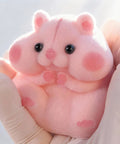 Totally Sweet Handmade Squishy Hamster Toy For Chill Out Vibes, soft pink silicone fidget toy held in hand for stress relief.