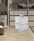 Layered Hanging Storage Bag Slick Nonwoven Closet Organizer With Roomy Pockets Low Key, filled with towels in closet.