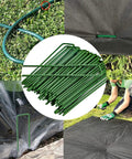 U Shaped Galvanized Steel Ground Pins Garden Stakes And Staples For Landscape Netting And Ground Sheets Heavy Duty Pegs 6 Inch 40 Pack Green Yard Workhorse shown in use.