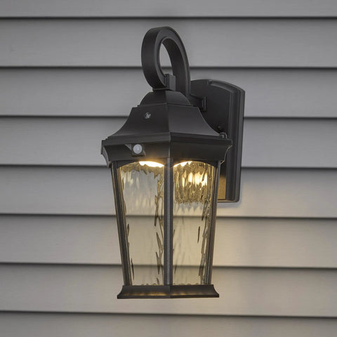 Heavy Duty Led Motion Sensor Outdoor Wall Light With 800 Lumens Super Bright 3000K Warm White Glow mounted on exterior wall.
