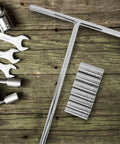 Beefy Metric T Handle Socket Wrench Set Rock Solid Vanadium Steel Spanners with knurled grip on wooden surface.